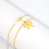 Conjunto Colar e Brinco Lacinho Detalhado Banhado a Ouro